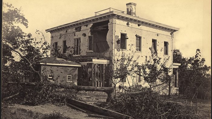 The shell-damaged Potter House on the Atlanta battlefield, 1864