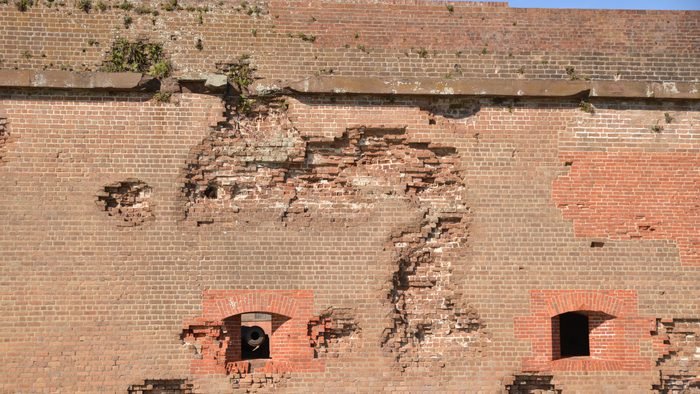Cannon-scarred brick wall at Fort Pulaski National Monument, Georgia